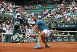 Spain's Rafael Nadal runs to return a shot in his second round match of the French Open tennis tournament against Argentina's Facundo Bagnis at the Roland Garros stadium in Paris, France, Thursday, May 26, 2016. (AP Photo/Alastair Grant)
