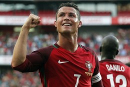 Portugal's Cristiano Ronaldo celebrates after scoring against Estonia during their friendly soccer match at Benfica stadium in Lisbon, Wednesday, June 8 2016. Portugal will play in the Euro2016 in Group stage against Austria, Hungary and Iceland in Group F. (AP Photo/Steven Governo)