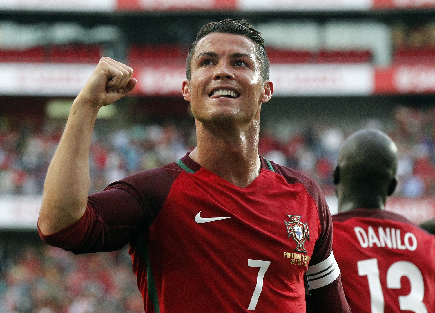 Portugal's Cristiano Ronaldo celebrates after scoring against Estonia during their friendly soccer match at Benfica stadium in Lisbon, Wednesday, June 8 2016. Portugal will play in the Euro2016 in Group stage against Austria, Hungary and Iceland in Group F. (AP Photo/Steven Governo)