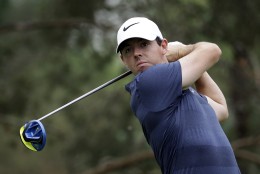 Rory McIlroy, of Northern Ireland, watches his tee shot on the second hole during the third round of the Memorial golf tournament, Saturday, June 4, 2016, in Dublin, Ohio. (AP Photo/Darron Cummings)