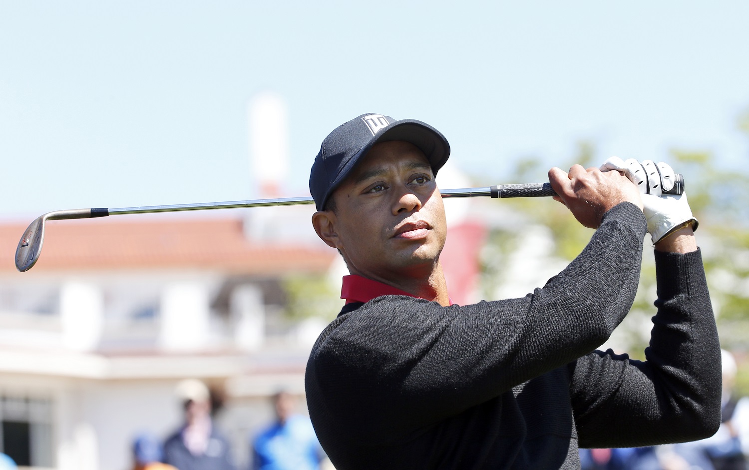 Tiger Woods takes a practice swing before hitting three ceremonial golf balls during a Quicken Loans National tournament media availability on the 10th tee at Congressional Country Club, Monday, May 16, 2016 in Bethesda, Md. (AP Photo/Alex Brandon)