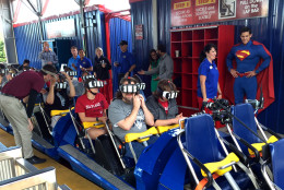 Riders prepare for “take off” on Six Flags America’s SUPERMAN: Ride of Steel Virtual Reality Coaster ride. (Courtesy Six Flags America)