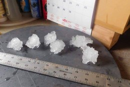 The family snapped a photo of a jagged hailstone measuring roughly 4.25 inches from spire to spire and sent it to WTOP. (Courtesy Shelly Rencher)