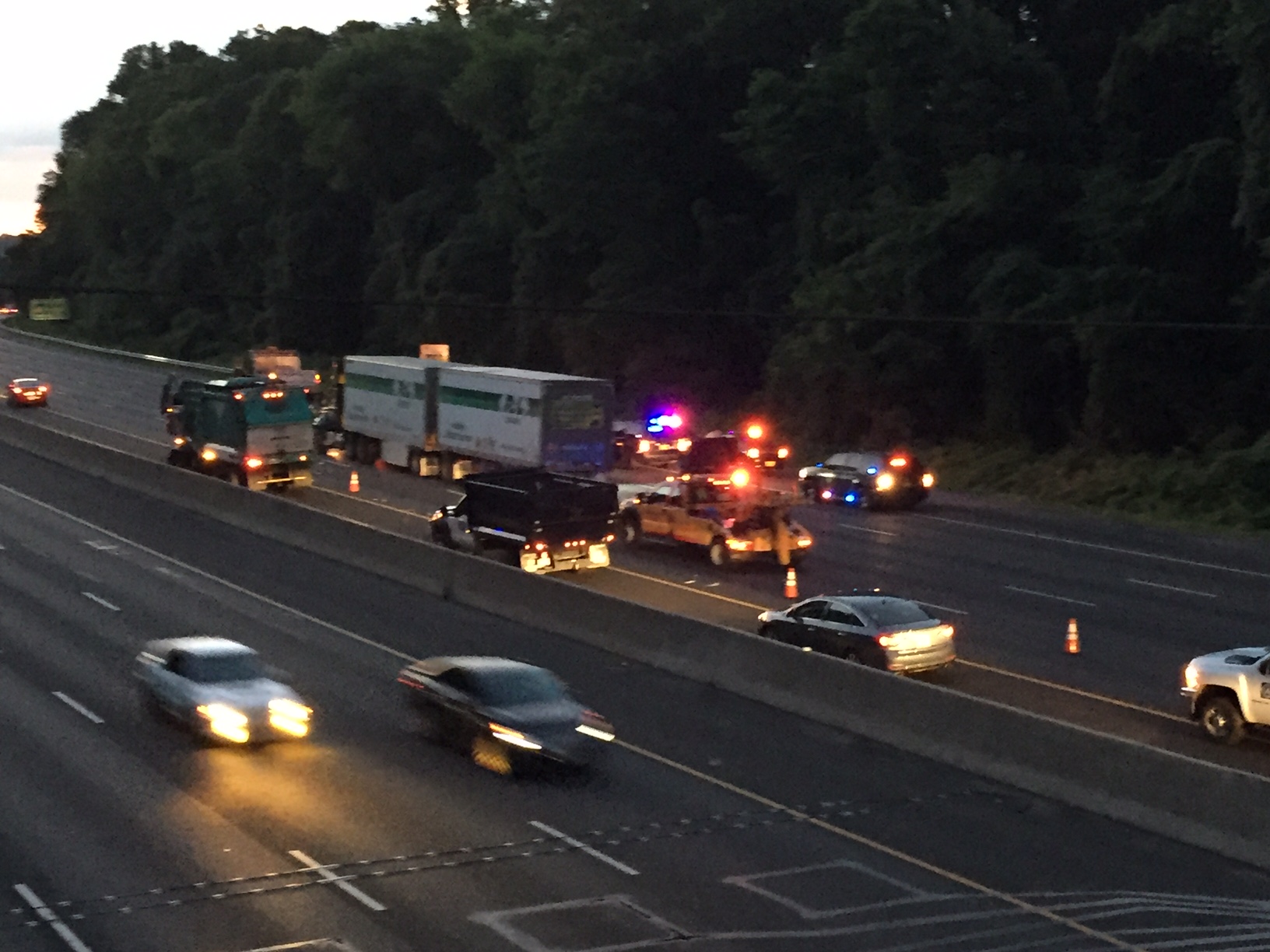 A truck struck a car and halted traffic on the Inner Loop of I-495 in Montgomery County by Persimmon Tree Lane early Saturday, June 18.  (Dennis Foley/WTOP)