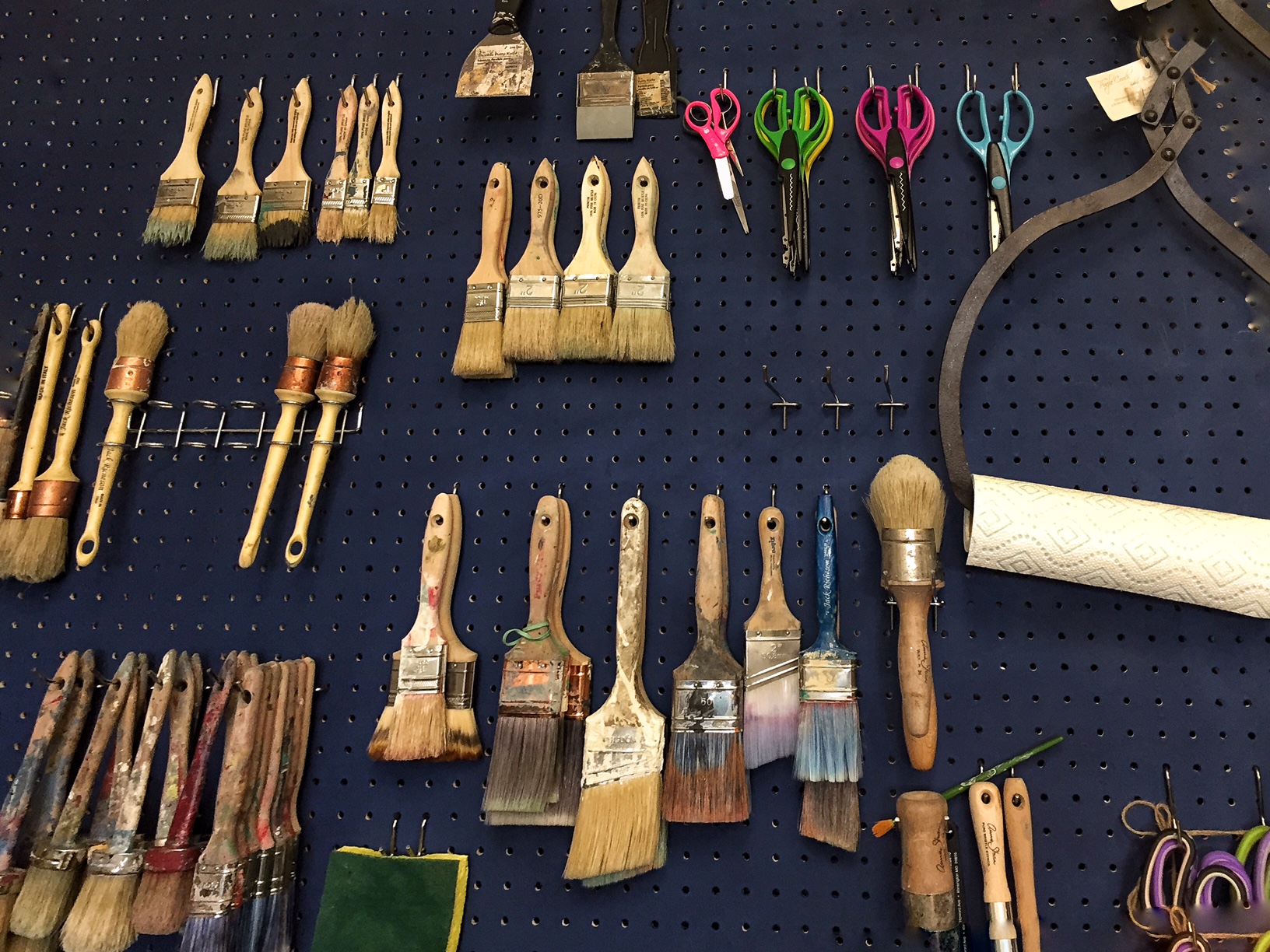 Tools of the trade: an assortment of brushes for the workshops Akerele hosts at her shop. (Kate Ryan/WTOP)