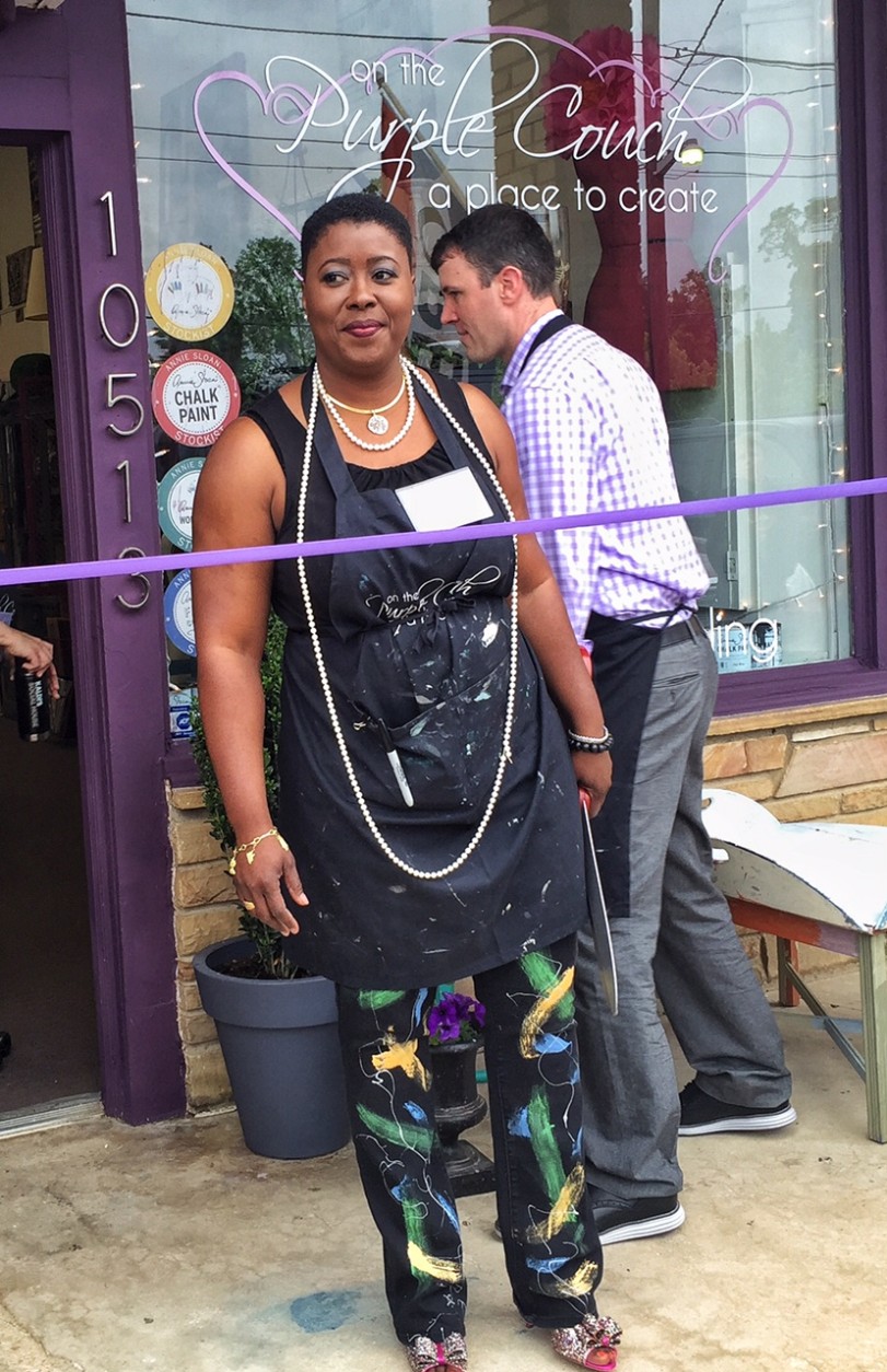 Akerele gets ready for the ribbon cutting at her new shop. (Kate Ryan/WTOP)