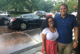 Scott Thomas and Britnni Guevarna were going to get milkshakes when the car they were in started to sink as it drove over a metal panel in Tenleytown. (Mike Murillo/WTOP)
