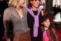 "Beautiful" director Sally Field, center, poses for photographers with "Beautiful" actresses Joey Lauren  Adams, left, and Hallie Kate Eisenberg, Monday, Sept. 25, 2000, at the Los Angeles premiere of the film.  The movie is a female-powered comedy about the danger of losing your heart while attempting to follow it. (AP Photo/John Hayes)