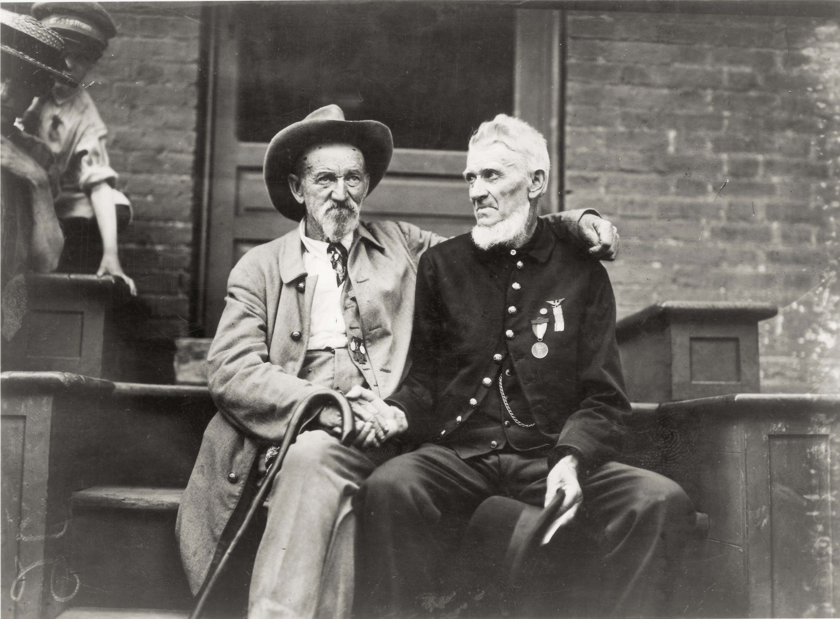 ** ADVANCE FOR SUNDAY MAY 21 AND THEREAFTER ** This photograph from the Library of Congress provided by Abrams Books shows an unidentified Confederate and Union soldier in a photo titled "The Blue and the Grey at Gettysburg, Assembly Tent" on the 50th anniversary reunion at Gettysburg, Penn., in 1913. The image is one of nearly 500 photographs, lithographs, paintings, drawings and cartoons from the Library of Congress's collection published in a new volume, "The American Civil War - 365 Days".  (AP Photo/Library of Congress)