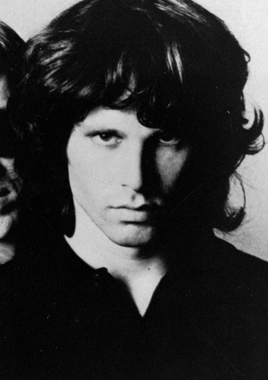 **  FILE  ** The late Jim Morrison of the rock group "The Doors" is shown in this undated photo. French radio personality Sam Bernett, whose French-language book is called "The End: Jim Morrison," claims Morrison died in a toilet stall of his nightclub, after what he believes was a heroin overdose. Bernett, who was in his early 20s when Morrison died in 1971, went on to become a prominent radio personality, rock biographer and a vice president of Disneyland Paris. Though he was pestered by reporters for years about rumors surrounding Morrison's death, he kept his story quiet until his wife suggested writing a book last year. (AP Photo/file)