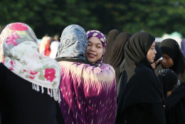 Muslims greet each other as they gather for prayer to mark the end of the holy month of Ramadan known as Eid al Fitr, Wednesday, July 6, 2016 in Manila, Philippines. The Eid, one of the most important holidays in the Muslim world, is celebrated with prayers, picnics and family reunions. (AP Photo/Bullit Marquez)