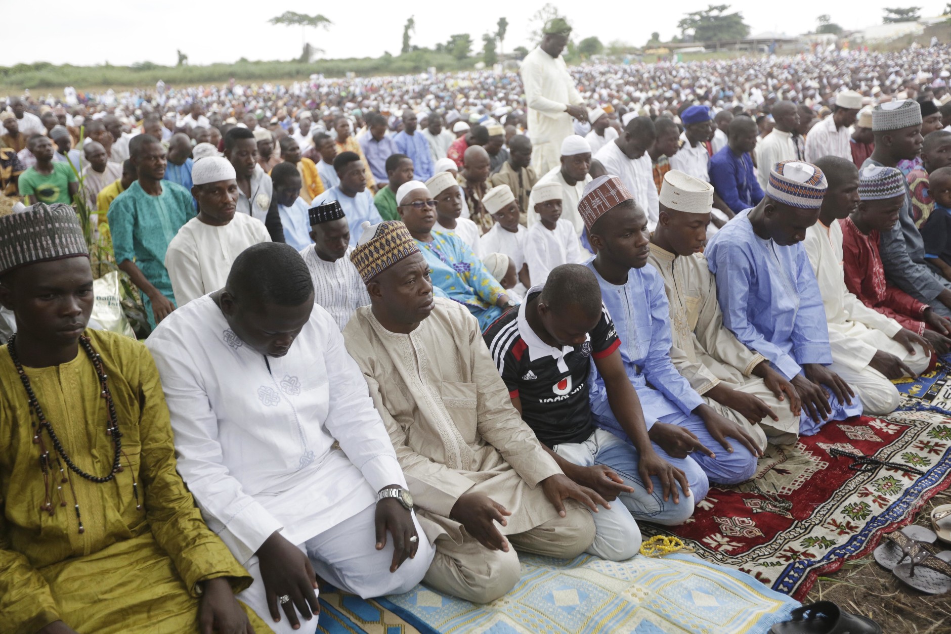 Nigeria Muslims attend the Eid al-Fitr prayers as Muslims around the world celebrate the end of the holy month of Ramadan, in Lagos, Nigeria, Wednesday, July 6, 2016 (AP Photo/Sunday Alamba)