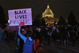 A Black Lives Matter sign is held up near the Capitol as a protest march about police brutality arrived after having started near the White House, Thursday, July 7, 2016, in Washington. (AP Photo/Paul Holston)