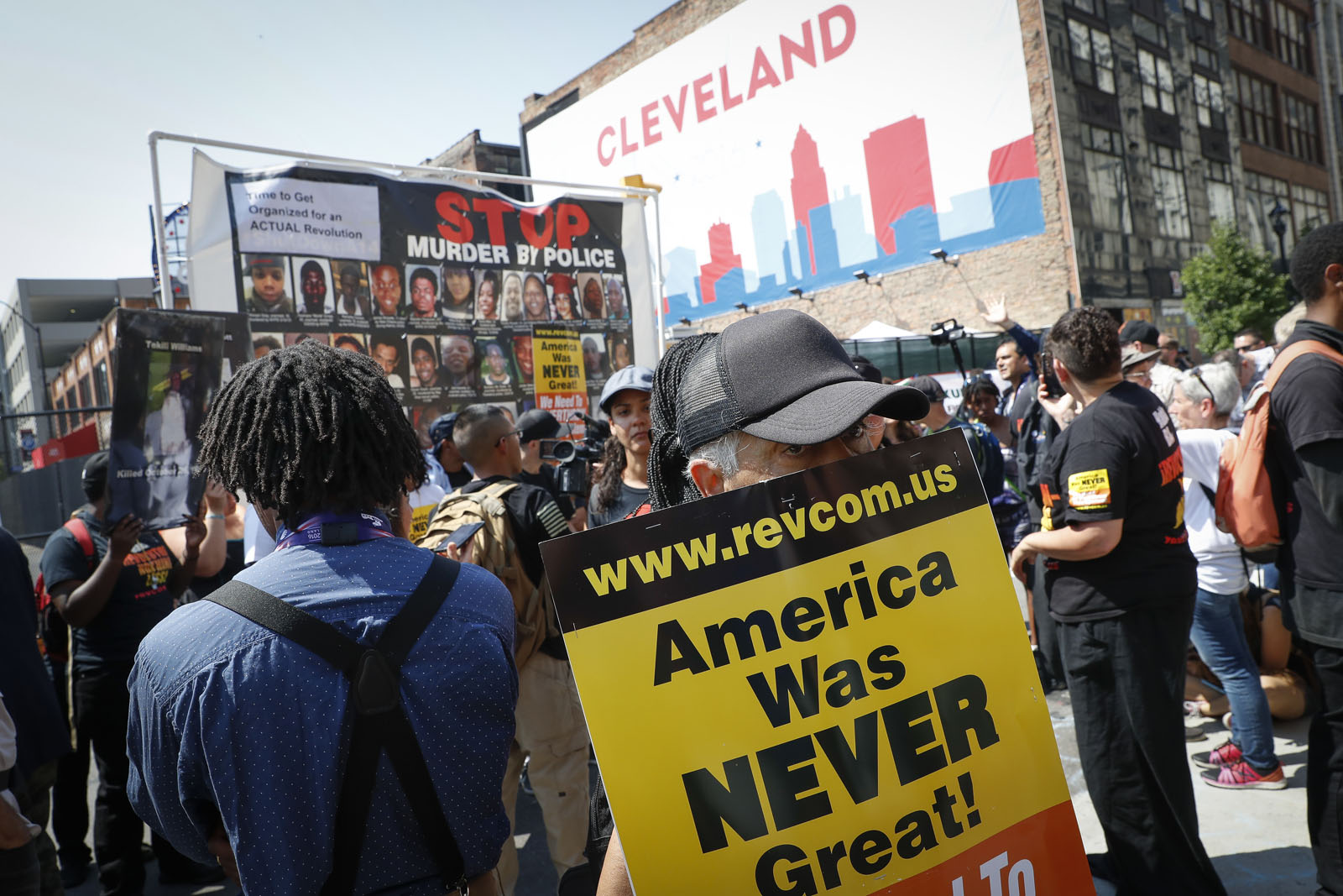Protestors demonstrate outside the Republican National Convention on Tuesday, July 19, 2016, in Cleveland, during the second day of the Republican convention. (AP Photo/John Minchillo)
