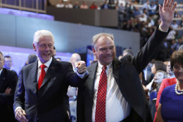Former President Bill Clinton and Democratic vice presidential candidate, Sen. Tim Kaine, D-Va., arrive on the convention floor before Democratic presidential nominee Hillary Clinton speaks during the final day of the Democratic National Convention in Philadelphia, Thursday, July 28, 2016. (AP Photo/Carolyn Kaster)