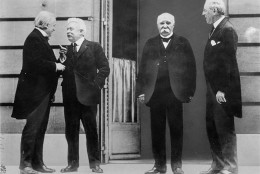 The Big Four of the Allies chat while gathering in Versailles for the Treaty of Versailles, which officially ended World War I, in this 1919 photo.  They are, left to right, David Lloyd George, of Great Britain, Vittorio Orlando, of Italy, Georges Clemenceau, of France, and Woodrow Wilson, United States President.  (AP Photo)