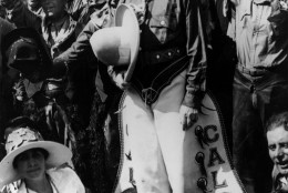U.S. President Calvin Coolidge, clad in cowboy attire celebrates the Fourth of July Holiday with his wife Grace Goodhue Coolidge in Rapid City North Dakota on July 4, 1927.  Others are unidentified.  (AP Photo)