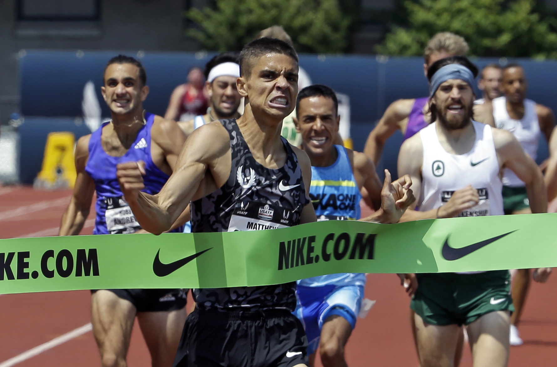 Matthew Centrowitz hits the tape to win the 1,500 meters at the U.S. Track and Field Championships in Eugene, Ore., Saturday, June 27, 2015. (AP Photo/Don Ryan)