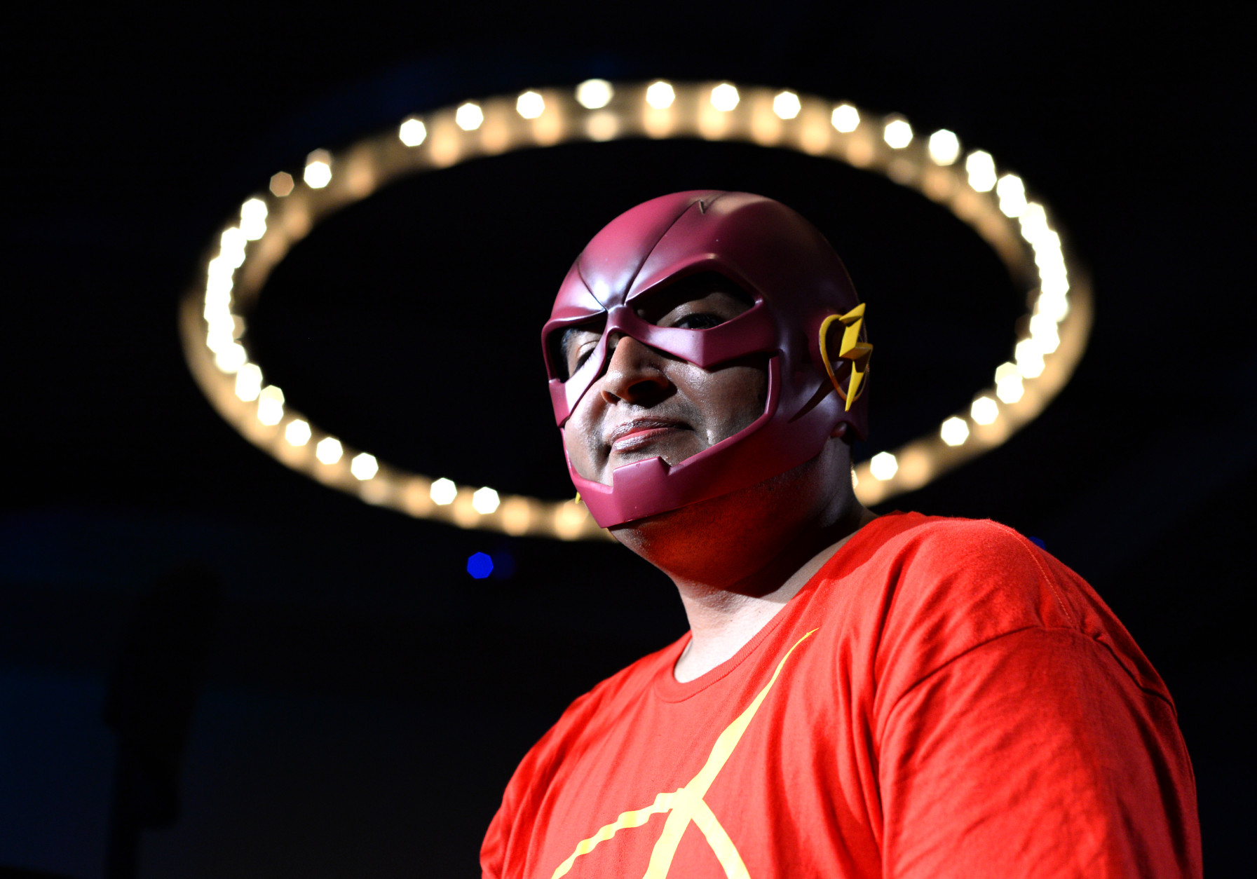 Fan dressed as the Flash stands in line to ask a question during the Q and A at "The Flash" panel on day 3 of Comic-Con International on Saturday, July 23, 2016, in San Diego. (Photo by Al Powers/Invision/AP)