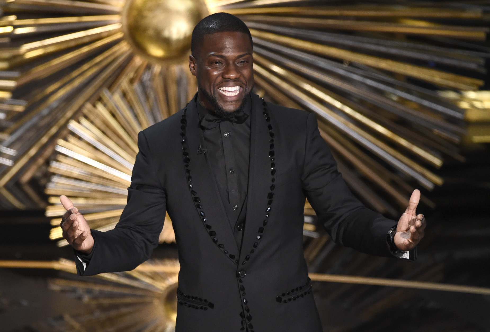 FILE- In this Feb. 28, 2016, file photo, Kevin Hart speaks at the Oscars at the Dolby Theatre in Los Angeles. Atria Publishing Group announced Tuesday, March 22, 2016, that Hart will release a memoir, From the Hart, about his early life and failures that gave him the motivation to become one a Hollywood star. (Photo by Chris Pizzello/Invision/AP, File)