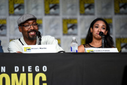 Jesse L. Martin, left, and Candice Patton attend "The Flash" panel on day 3 of Comic-Con International on Saturday, July 23, 2016, in San Diego. (Photo by Al Powers/Invision/AP)