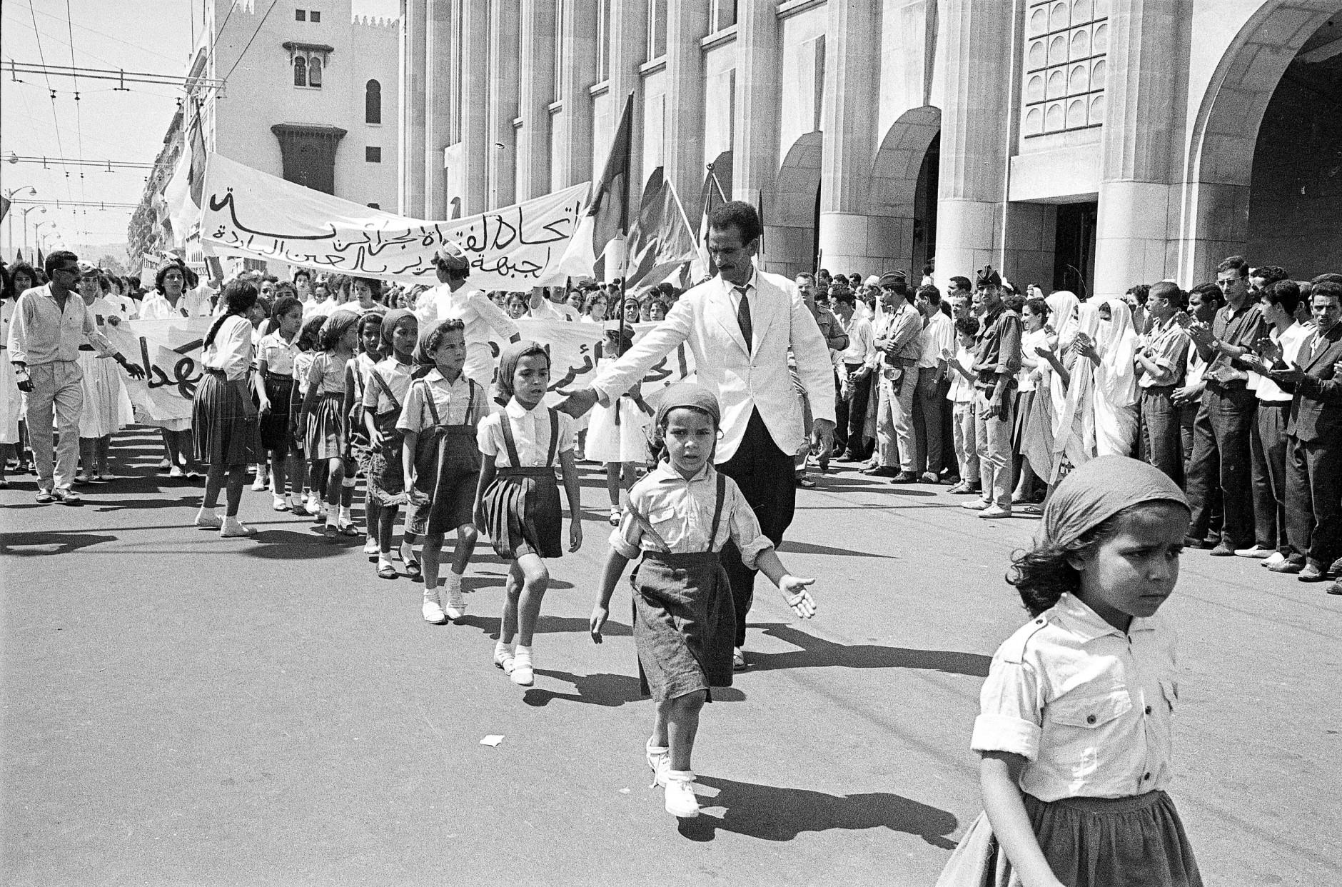 Muslim children march in a parade during official independence celebrations in Algiers, Algeria, on July 5, 1962.  The majority of Algerians voted for independence from French colonial rule in the nation-wide referendum held July 1.  (AP Photo)