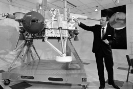 Viking project director Albert J. Kullas explains the full scale model of the lander after it was unveiled during a news briefing at the Martin Marietta space center in Denver, Colo., Feb. 11, 1971.  Viking will travel nearly a year and some 460-million miles before reaching Mars in mid-1976.  (AP Photo)