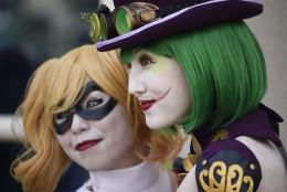 Costumed fans crowd pose for photographers in front of convention center on day three of the Comic-Con International held at the San Diego Convention Center Saturday July 23, 2016 in San Diego.  (Photo by Denis Poroy/Invision/AP)