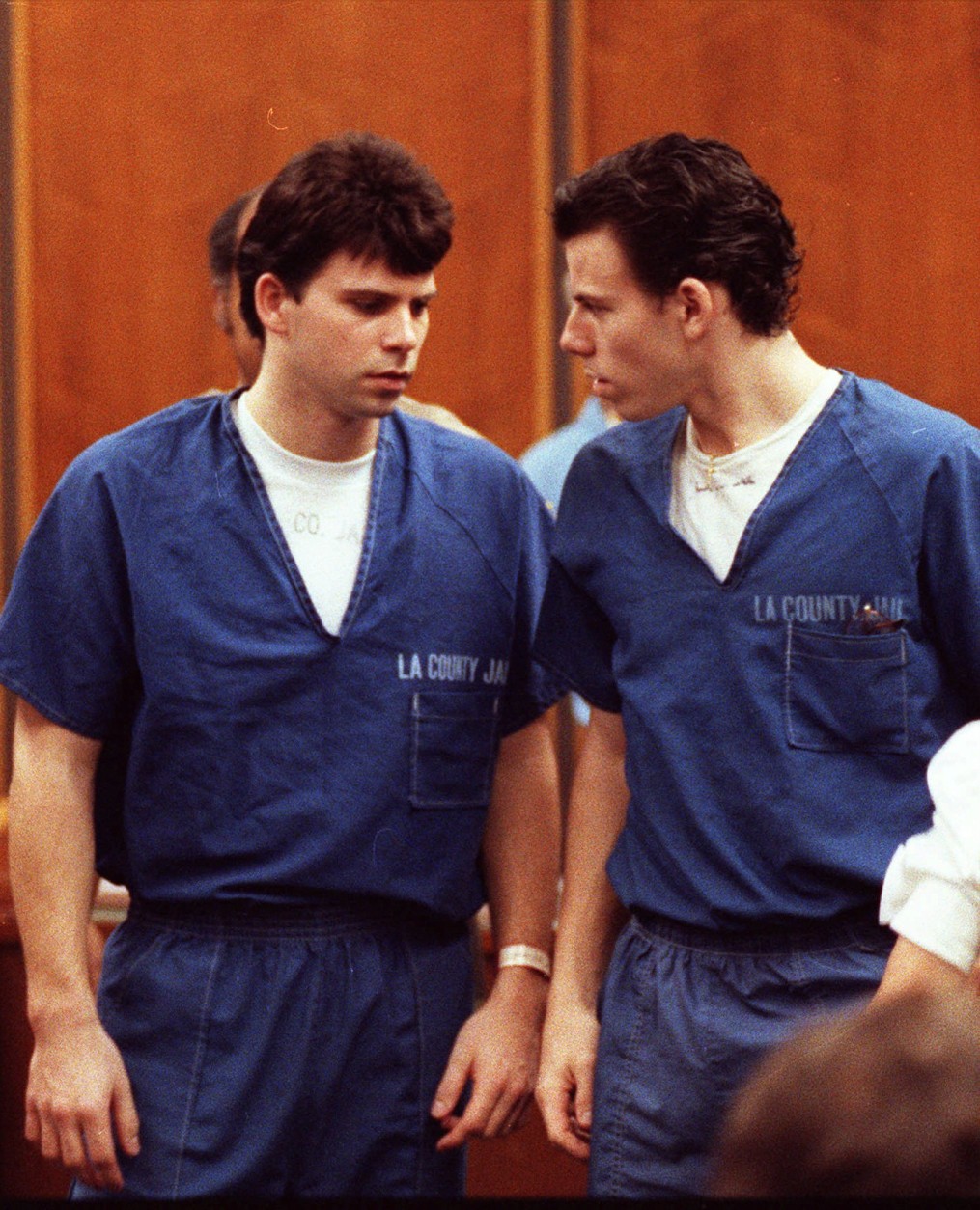 FILE--Lyle, left, and Erik Menendez leave the courtroom in Santa Monica, Calif., in this Aug. 6, 1990 file photo.   The brothers were found were found guilty of first-degree murder and conspiracy Wednesday, March 20, 1996,  of the August 1989 murders of their parents in their second trial in the Van Nuys Superior Court in Los Angeles. (AP Photo/Nick Ut, File)