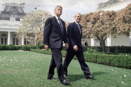 President Bill Clinton and British Prime Minister John Major walk in the Rose Garden of the White House in Washington  Thursday, April 4, 1995, after their oval office meeting. The two men were to have a joint news conference on Tuesday  afternoon. (AP Photo/Marcy Nighswander)