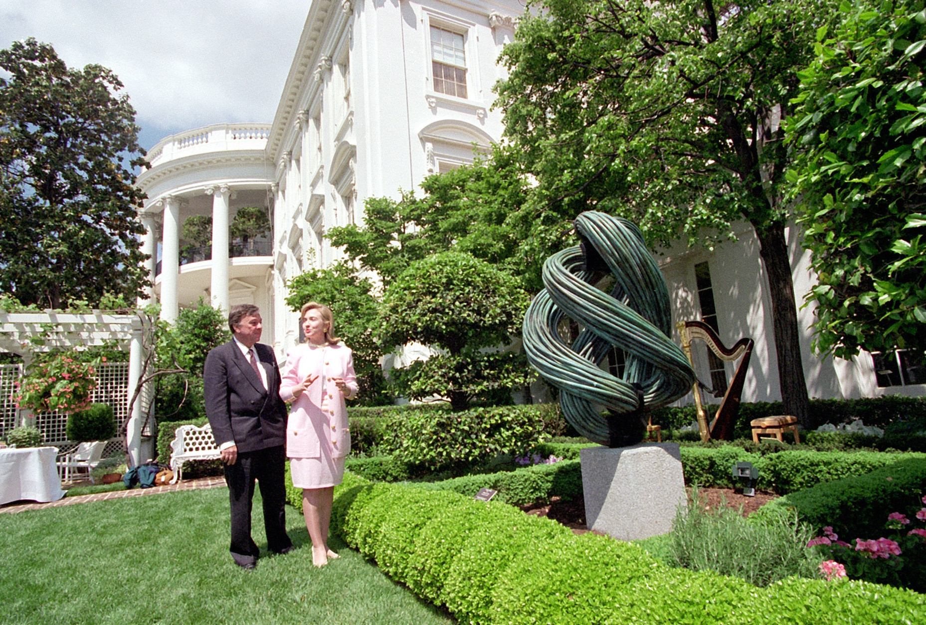 Hillary Rodham Clinton, accompanied by Towsend Wolfe, director and chief curator for the Arkansas Arts Center in Little Rock, unveiled the latest sculptures to grace the First Lady's Garden on May 15, 1995.  Displayed at right is 'Vertical Void' by Carol Hepper.  (AP Photo/Charles Tasnadi)