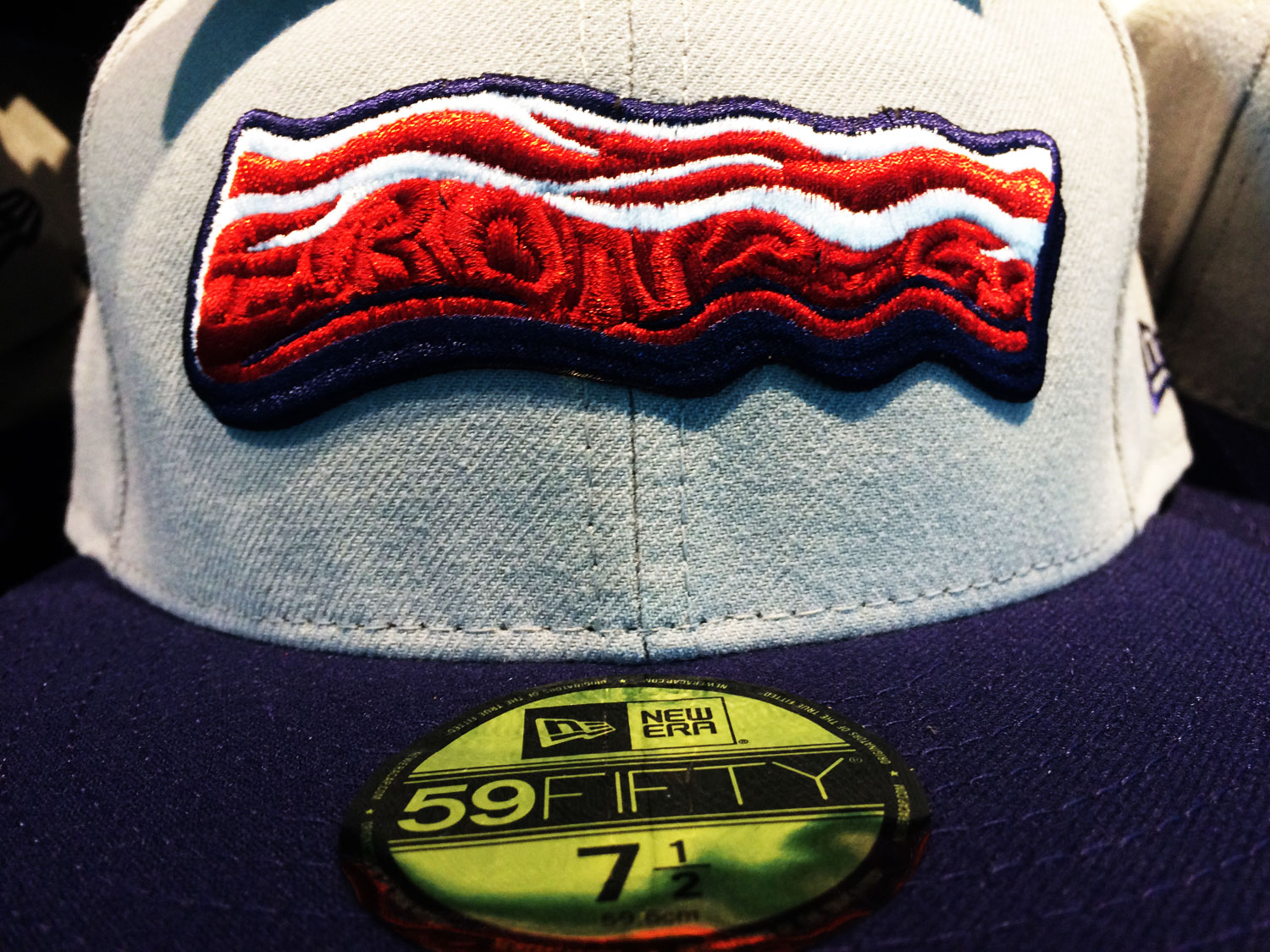 Lehigh Valley's bacon hat has the word IronPigs cleverly hidden in the logo. (WTOP/Noah Frank)