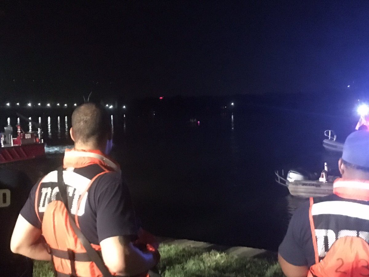 Rescuers search for a vehicle that plunged into the Potomac River on Sunday, July 9, 2016, (Courtesy DC Fire and EMS via Twitter)