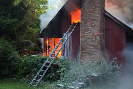 Montgomery County Fire worked to extinguish a house fire  Saturday morning on Norbeck Road in Silver Spring, Maryland. (Montgomery County Fire/Pete Piringer)