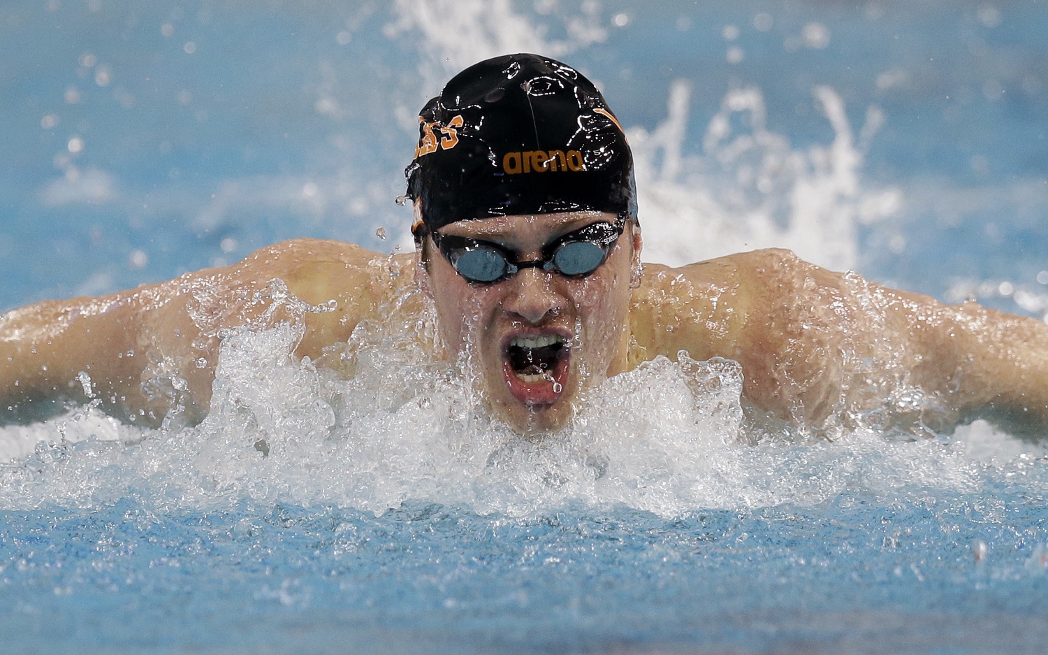 Jack Conger competes in the finals of the men's 200-meter butterfly at the Longhorn Aquatics Elite Invite swimming event, Sunday, June 5, 2016, in Austin, Texas. (AP Photo/Eric Gay)
