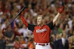National League's Todd Frazier, of the Cincinnati Reds, reacts after winning the MLB All-Star baseball Home Run Derby, Monday, July 13, 2015, in Cincinnati. (AP Photo/Jeff Roberson)