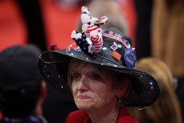 CLEVELAND, OH - JULY 20:  A delegate wears a hat with campaign memorabilia on the third day of the Republican National Convention on July 20, 2016 at the Quicken Loans Arena in Cleveland, Ohio. Republican presidential candidate Donald Trump received the number of votes needed to secure the party's nomination. An estimated 50,000 people are expected in Cleveland, including hundreds of protesters and members of the media. The four-day Republican National Convention kicked off on July 18.  (Photo by Jeff Swensen/Getty Images)