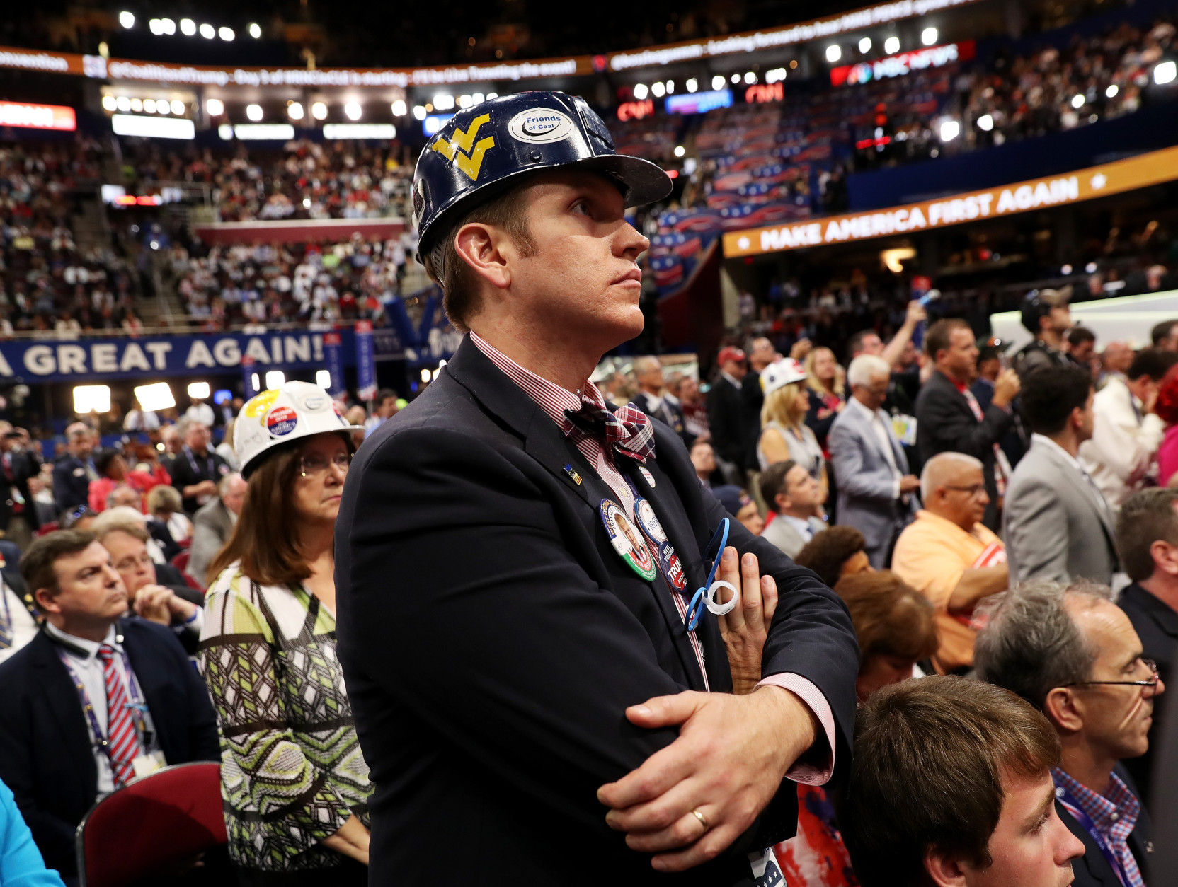 CLEVELAND, OH - JULY 20: A West Virginia delegate stands as he listens to Sen. Ted Cruz (R-TX) delivering a speech on the third day of the Republican National Convention on July 20, 2016 at the Quicken Loans Arena in Cleveland, Ohio. Republican presidential candidate Donald Trump received the number of votes needed to secure the party's nomination. An estimated 50,000 people are expected in Cleveland, including hundreds of protesters and members of the media. The four-day Republican National Convention kicked off on July 18.  (Photo by John Moore/Getty Images)