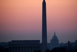 WASHINGTON, DC - JULY 21: The early morning sun begins to rise over the US Capitol, Washington, Monument and Lincoln Memorial, on July 21, 2016 in Washington, DC. Washington area temperatures are forecasted to reach the upper 90s for the next few days. (Photo by Mark Wilson/Getty Images)