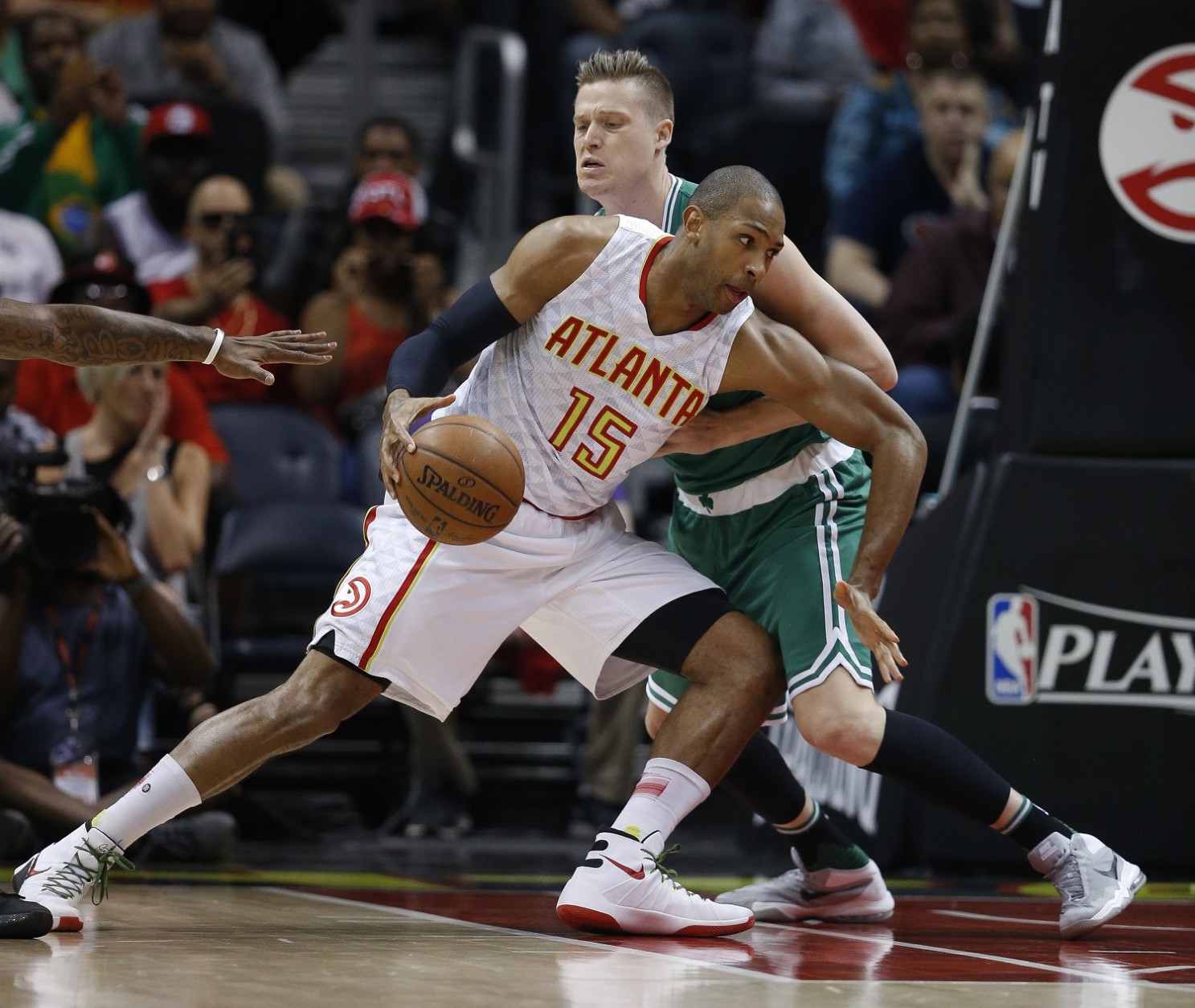 FILE - In this April 26, 2016, file photo, Atlanta Hawks center Al Horford (15) drives against Boston Celtics forward Jonas Jerebko during the first half of Game 5 of an NBA basketball first-round playoff series in Atlanta. (Toronto's DeMar DeRozan, Atlanta's Al Horford, Memphis point guard Mike Conley and Houston's Dwight Howard are among those who figure to become free agents this summer when the NBA's new television deal will kick in. (AP Photo/John Bazemore, File)