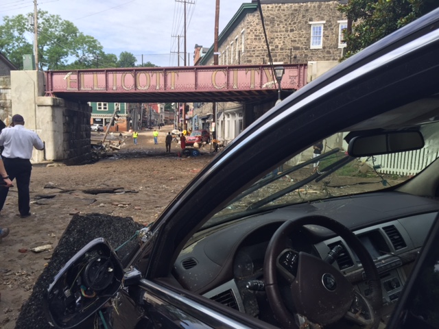 Severe flooding brought extensive damage to vehicles, roads, homes and businesses in Ellicott City. (WTOP/Dennis Foley)