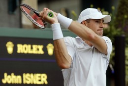 John Isner of the U.S plays a return during his men's singles match against Matthew Barton of Australia on day five of the Wimbledon Tennis Championships in London, Friday, July 1, 2016. (AP Photo/Alastair Grant)