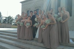 NBC Washington's Meteorologist Lauryn Ricketts (front, far right)  poses as she and the other bridesmaids get their photos taken at the Masonic Temple in Old Town Alexandria, Virginia, in more than 100 degree heat. (Storm Team 4/Lauryn Ricketts)