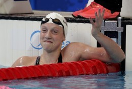 United State's Katie Ledecky celebrates after setting a world record during her heat in the women's 1500m at the Swimming World Championships in Kazan, Russia, Monday, Aug. 3, 2015. (AP Photo/Michael Sohn)