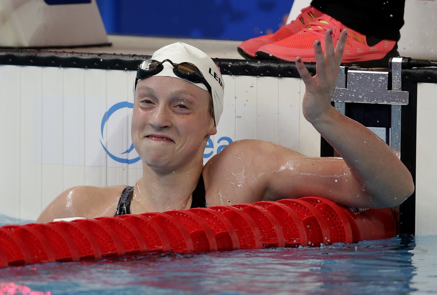 United State's Katie Ledecky celebrates after setting a world record during her heat in the women's 1500m at the Swimming World Championships in Kazan, Russia, Monday, Aug. 3, 2015. (AP Photo/Michael Sohn)