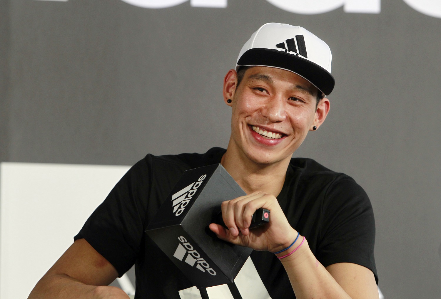 NBA Charlotte Hornets guard Jeremy Lin answers questions during a media event in Taipei, Taiwan, Friday, June 10, 2016. Lin is in Taiwan to host basketball clinics and media events from June 10-17. (AP Photo/Chiang Ying-ying)