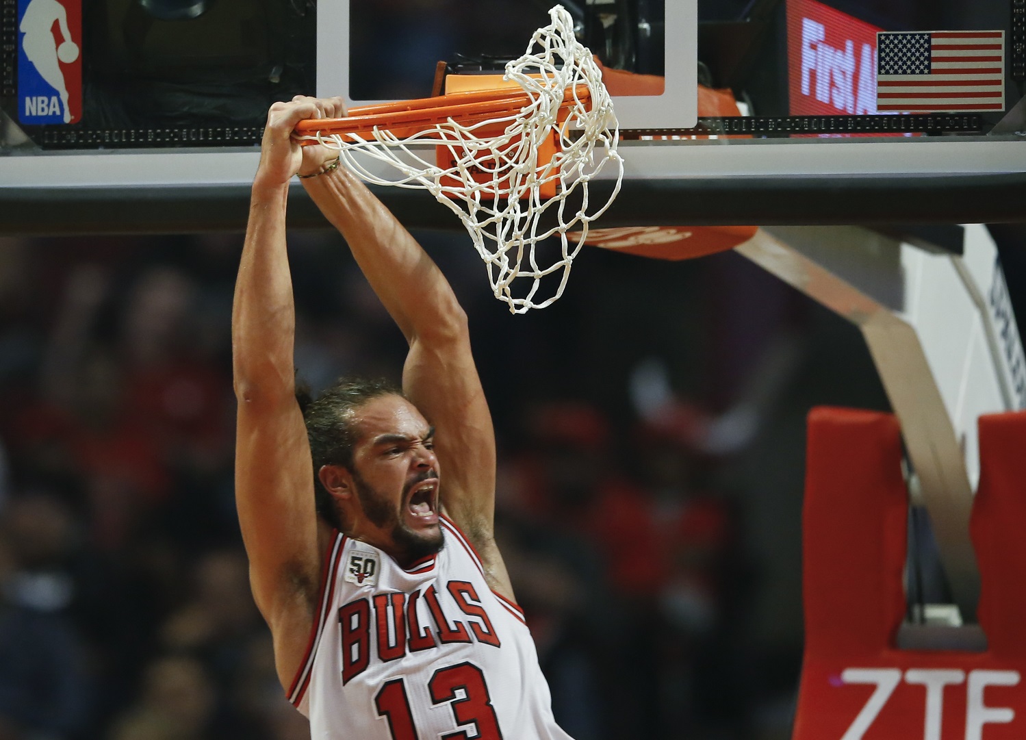 FILE- In this Nov. 1, 2015, file photo, Chicago Bulls center Joakim Noah, reacts after scoring against the Orlando Magic, during the first half of an NBA basketball game in Chicago. A person with knowledge of the details says Joakim Noah and the New York Knicks have agreed to a four-year deal. The deal was agreed to Friday, July 1, 2016, the person told The Associated Press on condition of anonymity because deals cannot be signed until July 7. (AP Photo/Kamil Krzaczynski, File)