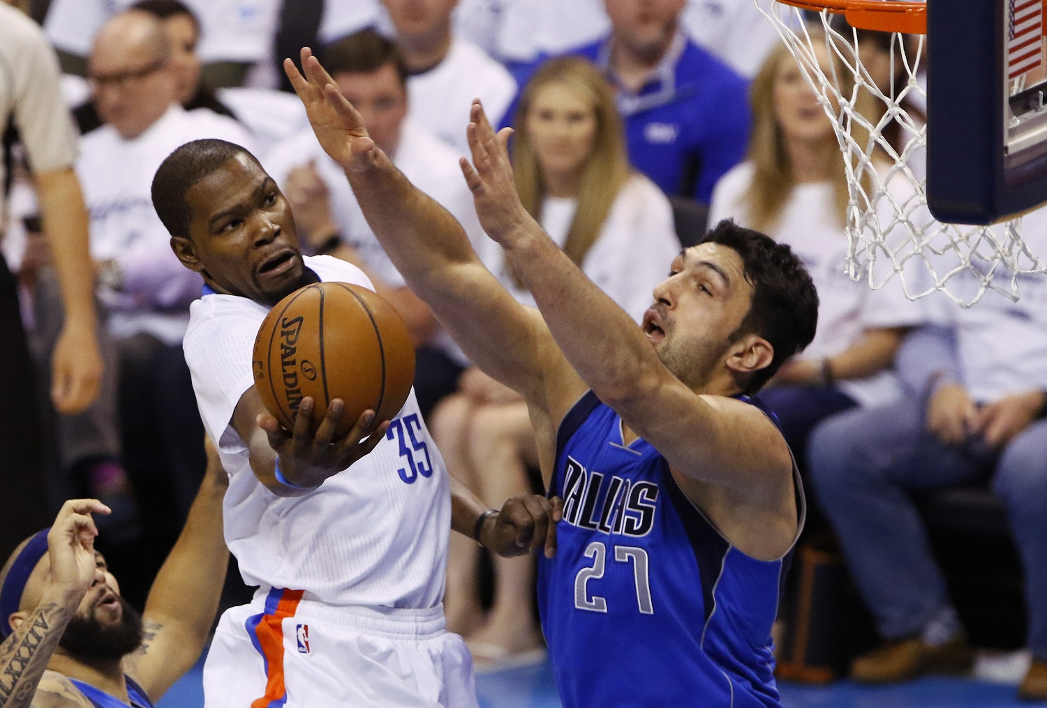 Oklahoma City Thunder forward Kevin Durant (35) goes to the basket as Dallas Mavericks center Zaza Pachulia (27) defends during the first half of Game 2 of a first-round NBA basketball playoff series, Monday, April 18, 2016, in Oklahoma City. (AP Photo/Alonzo Adams)