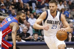 Dallas Mavericks forward Chandler Parsons (25) drives around Detroit Pistons forward Marcus Morris (13) during the first half of an NBA basketball game, Wednesday, March 9, 2016, in Dallas. (AP Photo/Jim Cowsert)