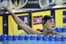 Leah Smith checks her time after her heat in the women's 800-meter freestyle preliminaries at the U.S. Olympic swimming trials, in Omaha, Neb., Friday, July 1, 2016. (AP Photo/Nati Harnik)